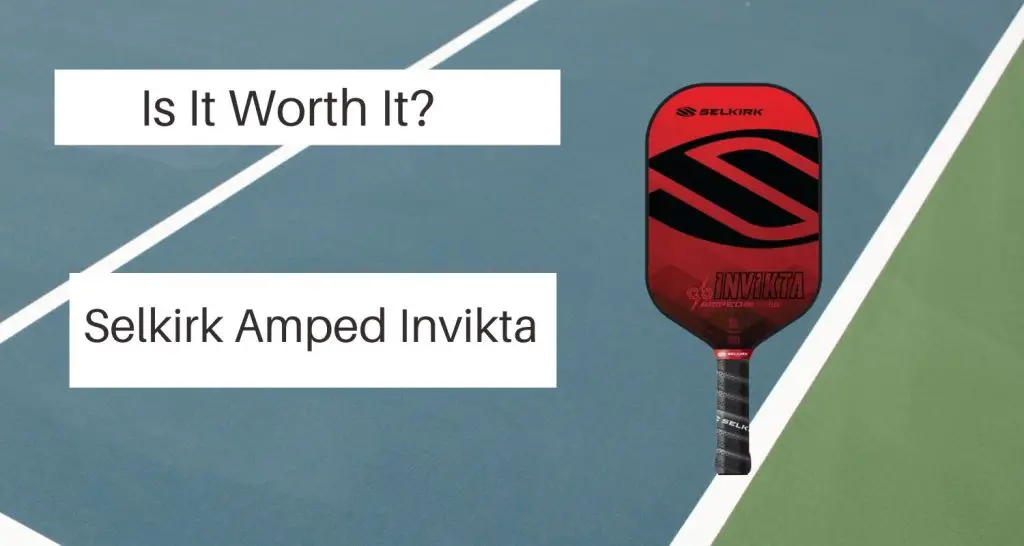 red Selkirk amped invikta Pickleball paddle on a pickleball court 